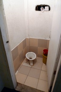 Bathroom/shower room with bucket/ladle to either flush or shower
